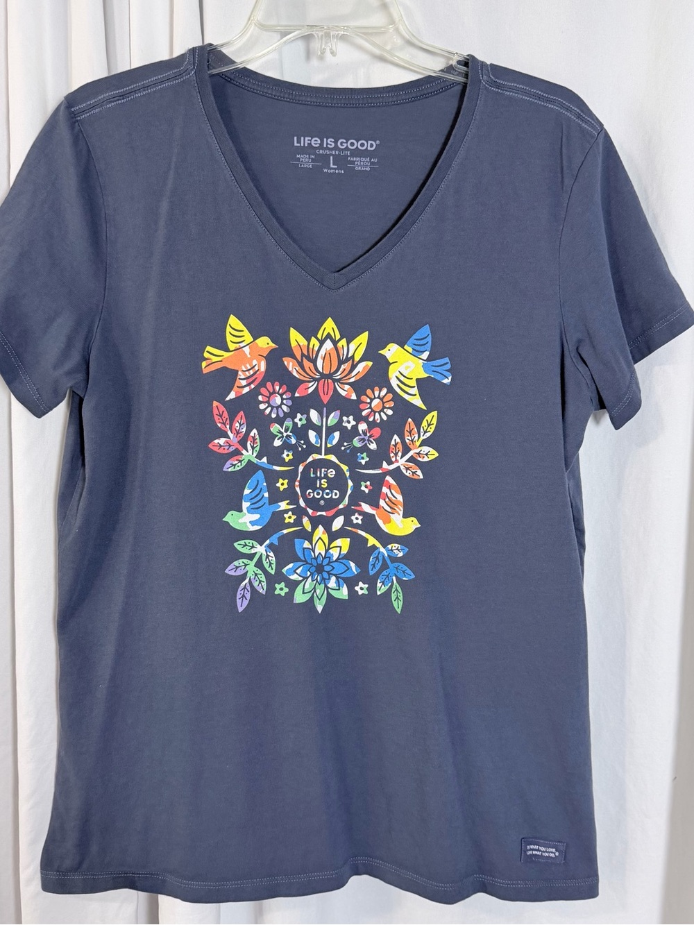 Life is Good Women's Navy V-Neck Tee with Colorful Floral Bird Graphic